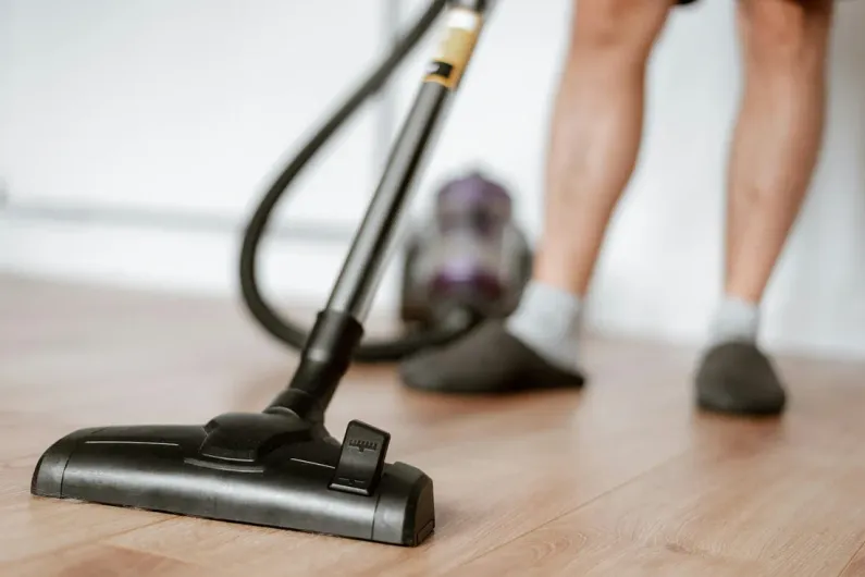 person vacuum cleaning
